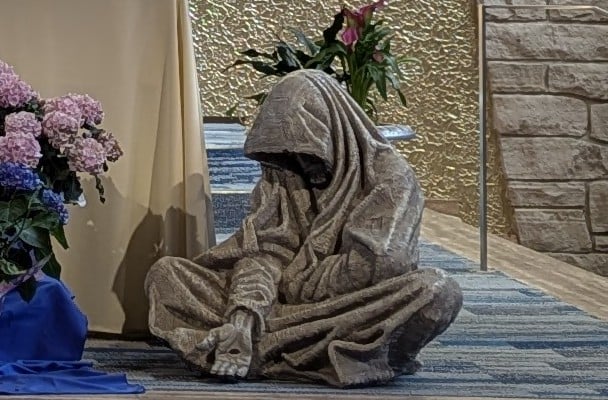 Statue by Timothy Schmalz "Whatsoever You Do"